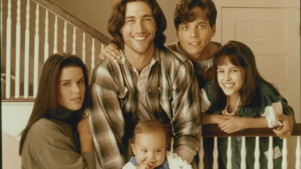 Party Of Five -- Left to Right: Neve Campbell (Julia Salinger): Matthew Fox (Charlie Salinger) - holding his on screen brother Owen Salinger (Played by Taylor and Brandon Porter): Scott Wolf (Bailey Salinger): Lacey Chabert (Claudia Salinger).