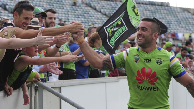 Paul Vaughan celebrates with Raiders fans earlier in the season.