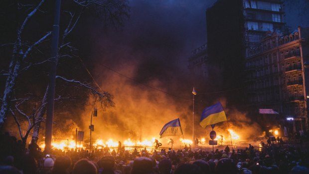 "For a few days barricades on Hrushevskoho street were burning, they were all the time with new tyres and Molotov cocktails', Kiev, 2014. By Maxim Dondyuk and shortlisted for the Priz Pictet. 