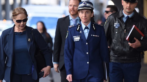 NSW Police Deputy Commissioner Catherine Burn (second from right) arrives at the Lindt cafe siege inquest on Tuesday.