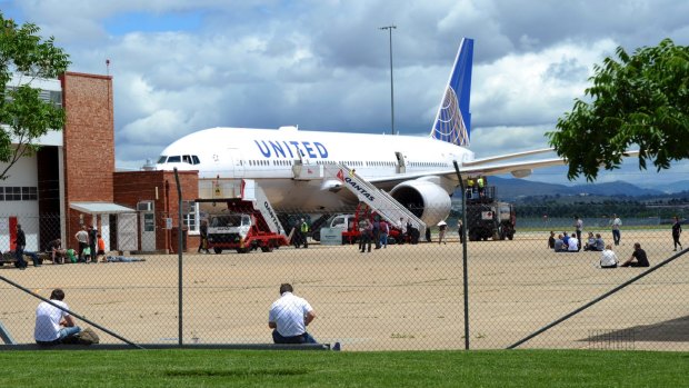 A United Airlines jet, diverted from Sydney, on the apron at RAAF Fairbairn in Canberra. 
