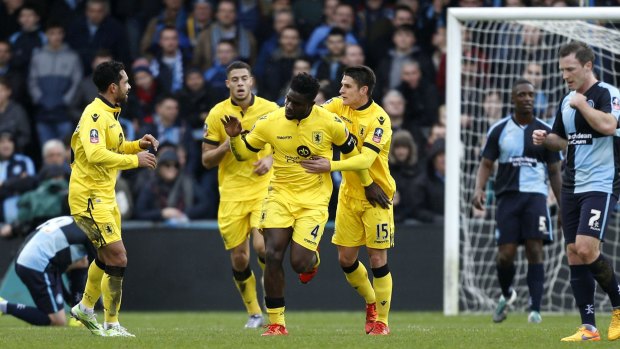 Aston Villa's Micah Richards, centre, celebrates scoring his side's first goal of the game.