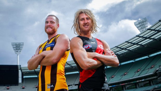 Hawthorn captain Jarryd Roughead and Essendon counterpart Dyson Heppell. 