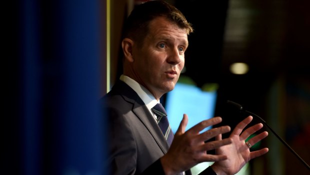 Premier Mike Baird is yet to win over even his own supporters on council mergers.
Photo: Steven Siewert