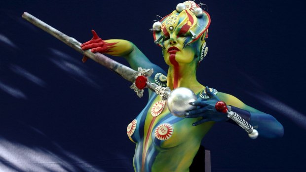 A model poses during the annual World Bodypainting Festival in Poertschach, Austria, July 3, 2015. The event takes place from July 3 to 5 at Lake Woerthersee in Austria's southern Carinthia province. 