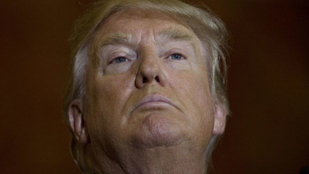 Donald Trump lifts his chin during a news conference at Trump Towers in New York in September. 