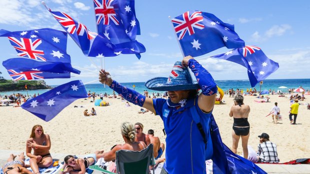 A flag seller on Coogee Beach on Australia Day 2016. 