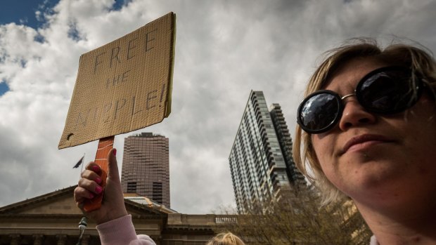 Annalisa Sher protesting outside the State Library during the annual SlutWalk down Swanston Street on Saturday.