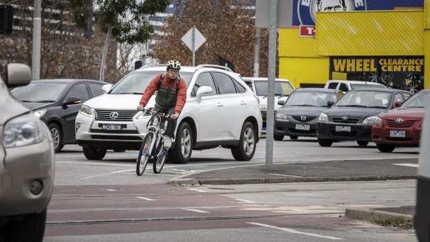 A cyclist negotiates the dreaded  Haymarket roundabout. 