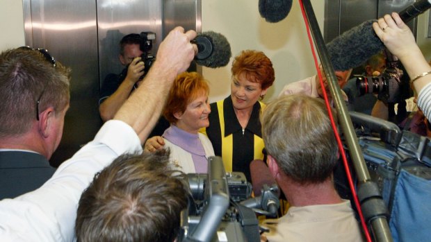 Pauline Hanson announces her 2004 Senate run alongside sister Judy Smith. 