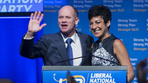 Campbell Newman, with his wife Lisa, waving goodbye to his political career following the LNP's 2015 state election loss.