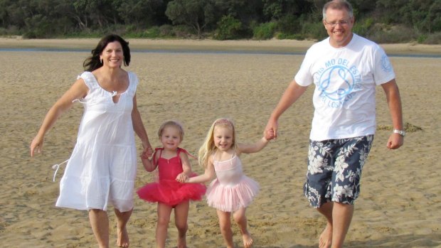 Morrison with his wife, Jenny, and daughters Lily, at left, and Abbey in 2012.