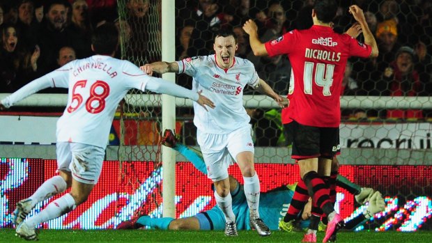 Brad Smith celebrates after scoring Liverpool's late equaliser.