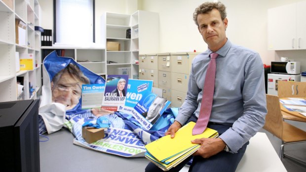 Declined to appear: Tim Crakanthorp in his Hunter Street, Newcastle, office with items he says were left behind by Tim Owen.