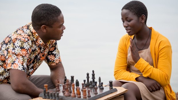 David Oyelowo (Robert Katende) and Madina Nalwanga (Phiona Mutesi) in <i>Queen of Katwe</i>, the true story of a girl whose life changes when she is introduced to chess.