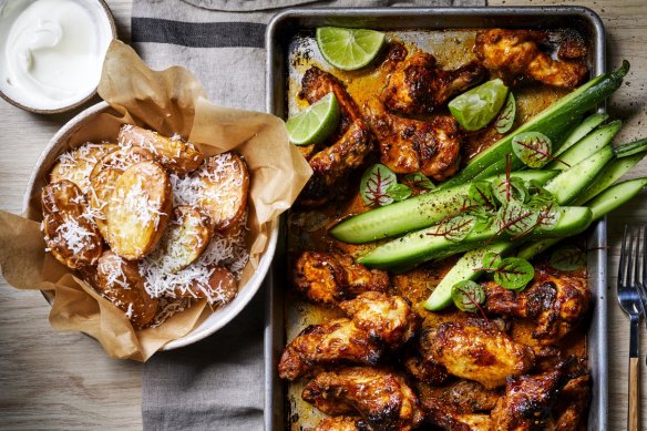 Charred tandoori chicken wings with crunchy coconut potatoes.