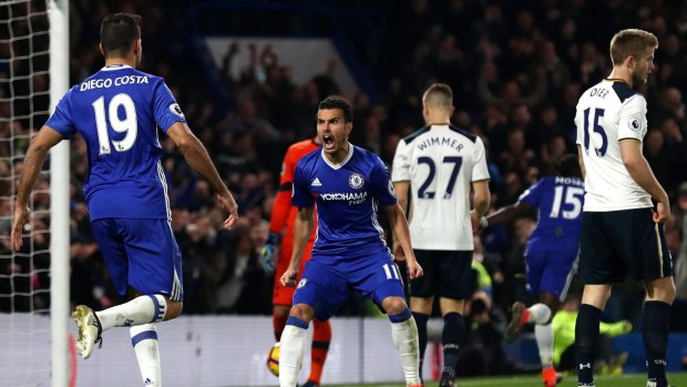 Top of the league: Pedro celebrates scoring Chelsea's first goal.