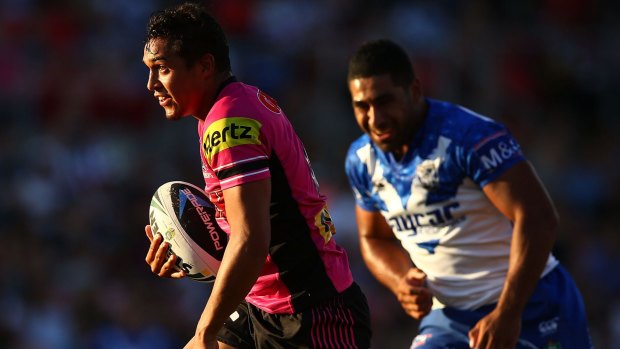 On the rise: Panthers back Te Maire Martin makes a break during the trial against the Bulldogs.