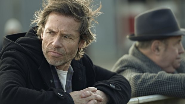 Fatherhood beckons: Guy Pearce in the ABC series <i>Jack Irish</i>.