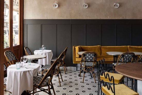 The dining room is one of three distinct spaces at the new Entrecote.