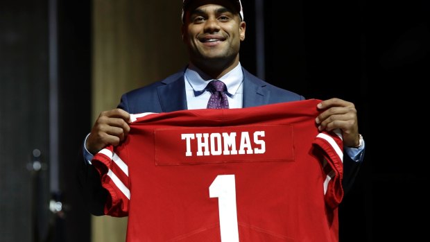 Stanford University star Solomon Thomas poses after being selected by the San Francisco 49ers.