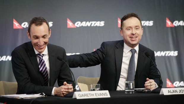 Qantas CFO Gareth Evans and CEO Alan Joyce announce the company's half year results in Sydney.