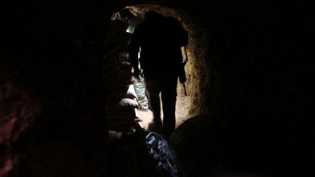 Kurdish forces found food and cooking utensils in the tunnels, indicating IS fighters had been living under destroyed towns to avoid air strikes.