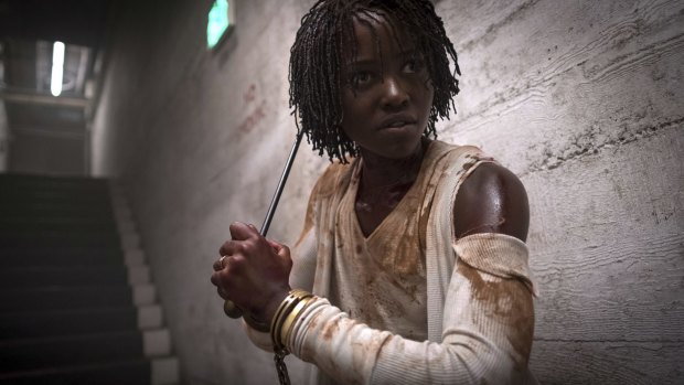 Lupita Nyong'o, pictured in a scene from Us, says it is most definitely a horror movie.