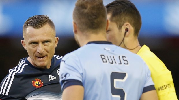 Getting stuck in: Besart Berisha remonstrates with Jordy Buijs on Thursday night.