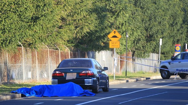 A body was found in the boot of a car in Lidcombe.