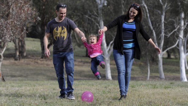Michael, Rebecca and 14-month-old Hazel Amaro enjoy Black Mountain Park.