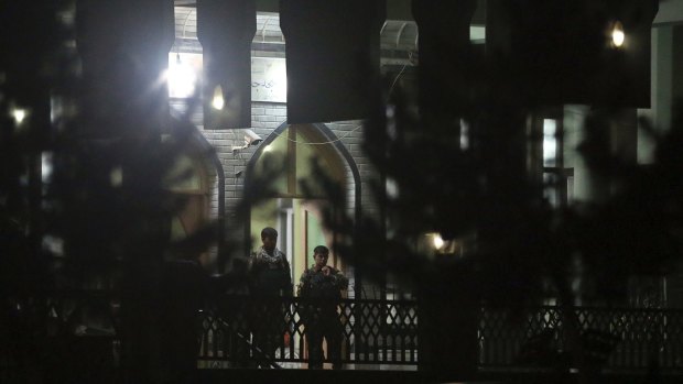 Security forces after the suicide attack on a Shiite mosque in Kabul, Afghanistan.