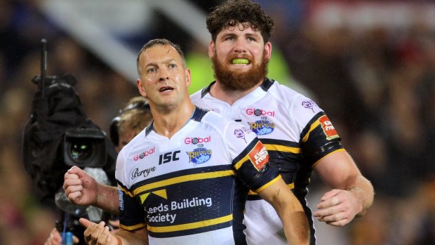 Leeds Rhinos' Danny McGuire celebrates scoring one of his two grand final tries.