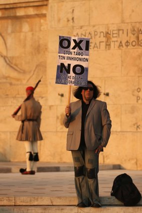 A lone protester on the steps of Greece's parliament.