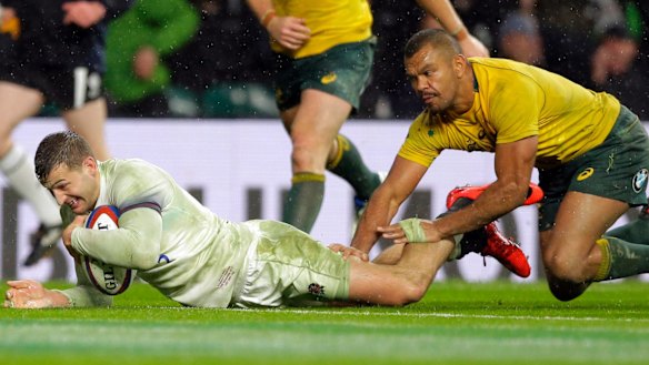 England's Jonny May scores a try, too quick for the Wallabies.