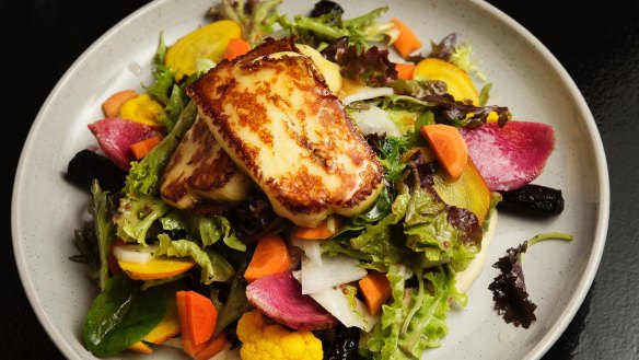 Haloumi salad with pickled vegetables and honey.