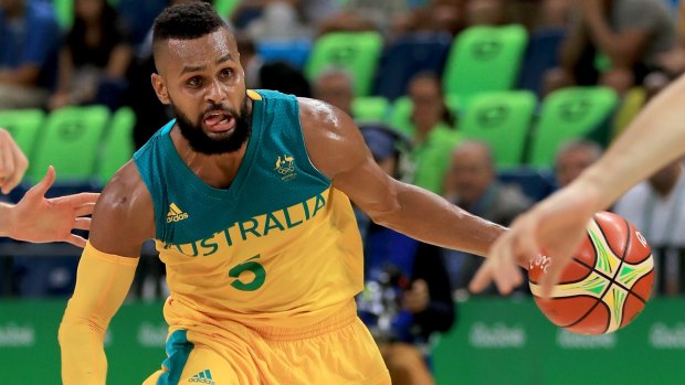 Hot hand: Patty Mills was influential against Lithuania.