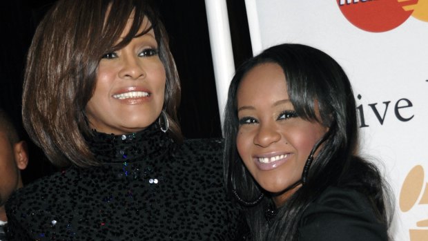 Whitney Houston, left, and daughter Bobbi Kristina Brown in 2011.