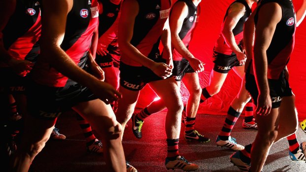 Essendon is working with the AFL to find a solution to their NAB Challenge team dilemma.