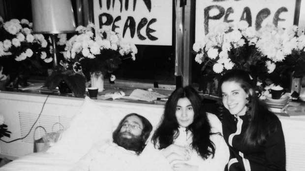  John Lennon, with his wife Yoko Ono and Gail Renard during his 1969 "bed-in" in Montreal.
