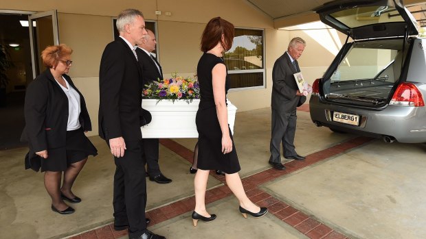 Members of South Australia Police, the South Australian government, the Commissioner for Victim's Rights and Peter Elberg Funerals carry Khandalyce's coffin. 