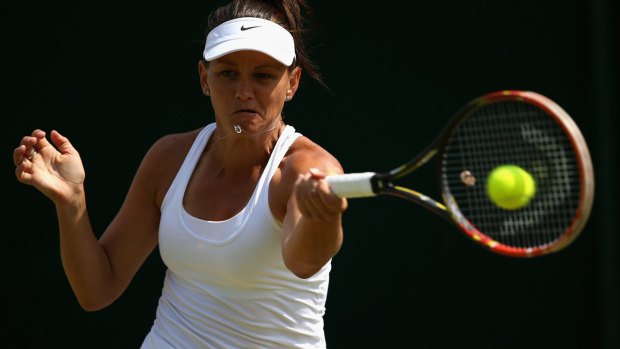 Casey Dellacqua has joined Sam Stosur in the third round of the Ladies Singles.