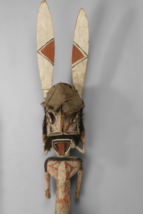 Wooden malanggan carving depicting a male figure from the Bismark Archipelago, Papua New Guinea. 