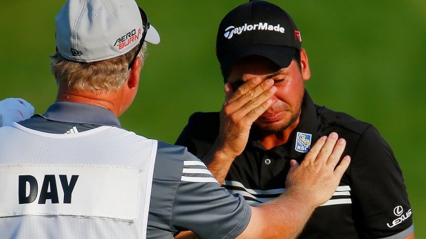 Canberra's Colin Swatton celebrates with Jason Day after he won his first and only major.