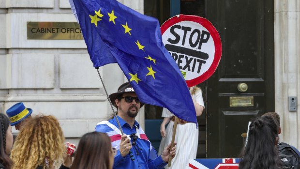 Anti-Brexit protesters demonstrate outside the Cabinet Office in Whitehall in London.