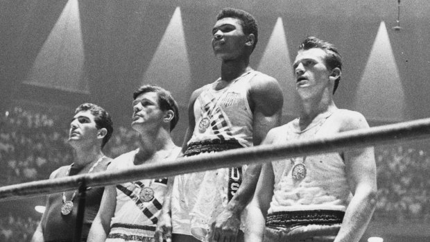 1960 Olympic gold medal winner Cassius Clay (later Muhammad Ali) with fellow light heavyweight boxers Zbigniew Pietrzykowski (Poland, silver) and joint bronze winners Giulio Saraudi of Italy and Australian Anthony Madigan (bronze)