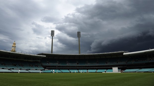 Storm warning: A weather front rolls over the SCG during the Shield match between NSW and Victoria.