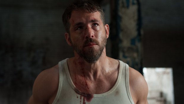 Ryan Reynolds, hotter than a 'Carolina Reaper' chilli right now, is killed off in the first reel of <i>Criminal</i>.