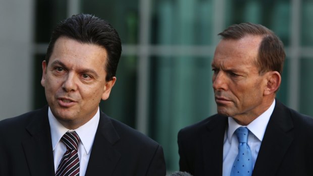 Independent Senator Nick Xenophon and Prime Minister Tony Abbott.