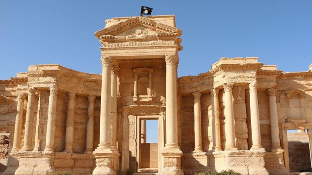 An Islamic State flag is seen flying on top of  the Roman theatre in the ancient city of Palmyra last month.
